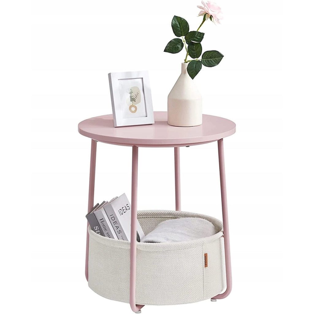 Tavolino rotondo moderno rosa pastello con cesto portaoggetti