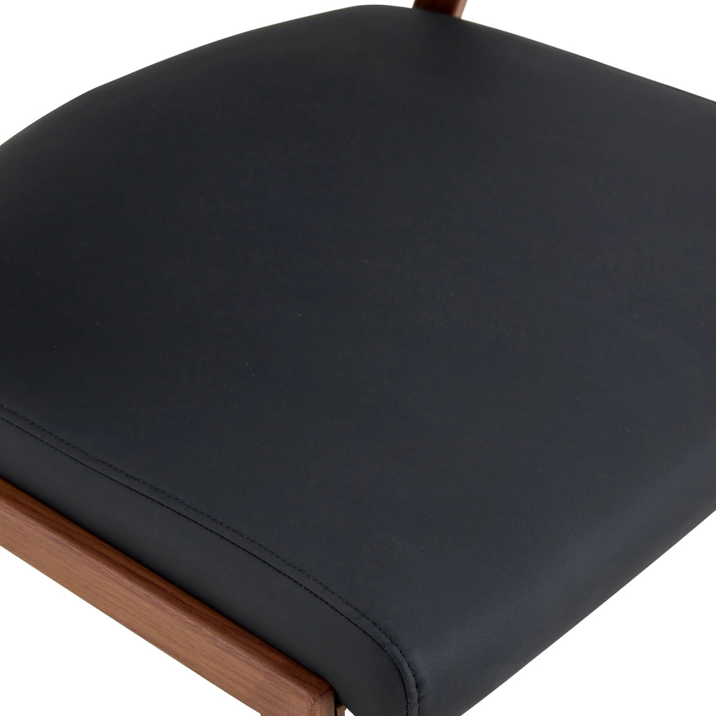 Set di 2 sedie da pranzo moderne in similpelle nera con struttura in metallo