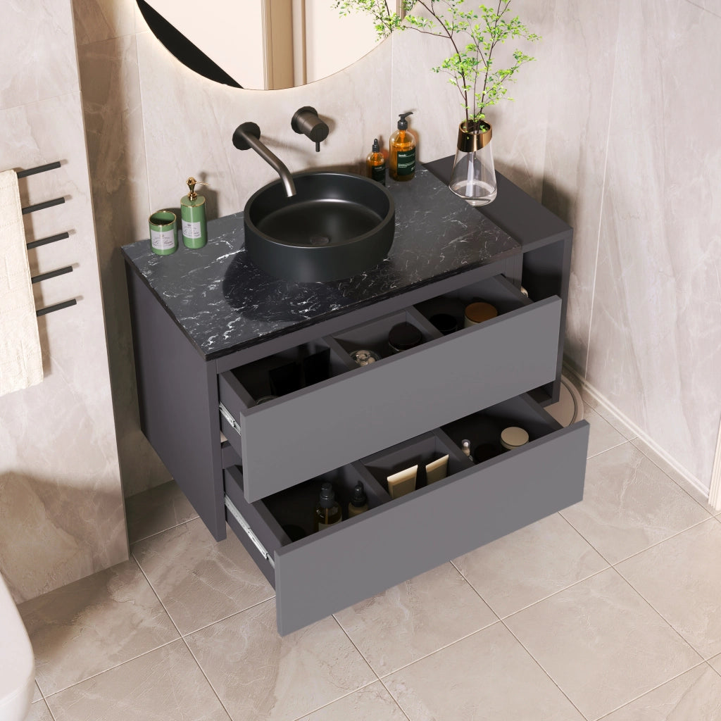Mobile bagno con lavabo rotondo in ceramica e piano in marmo; nero e grigio