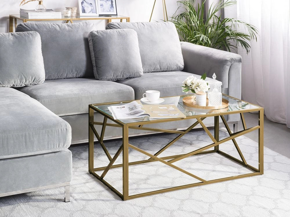 Tavolino da caffè con struttura in metallo dorato piano in vetro design geometrico glam