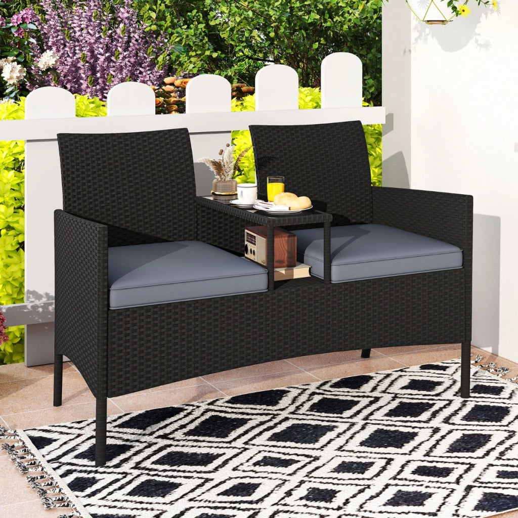Divano da esterno con tavolino integrato, Mobile in rattan per 2 persone con cuscini e piano in vetro temperato Nero