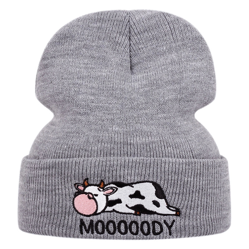 Cappelli grigi con ricamo "COW"