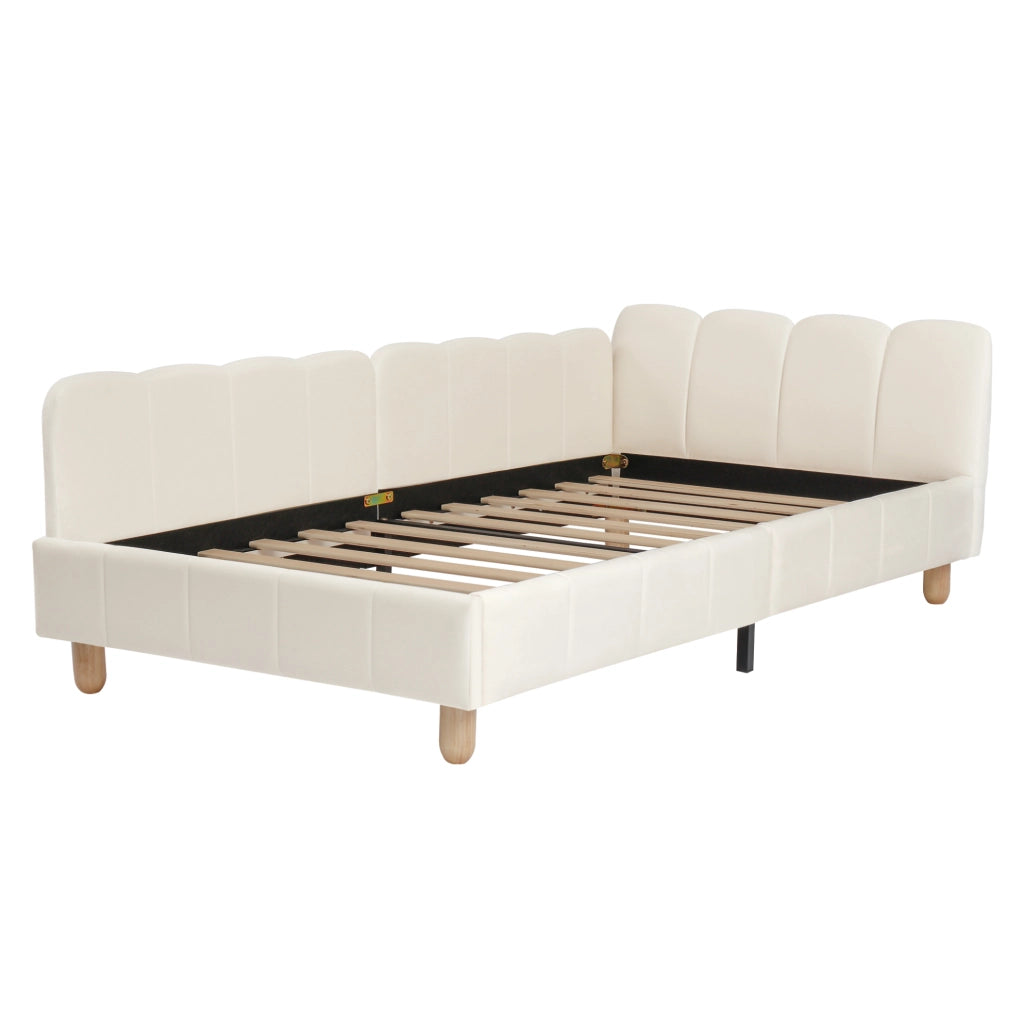 Letto per bambini imbottito in velluto beige con testiera ergonomica e tasche laterali
