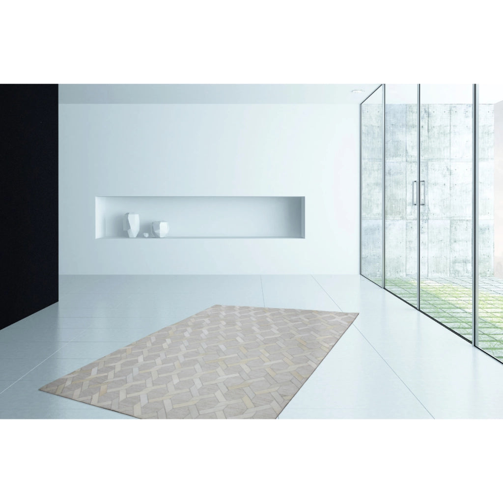 Tappeto di design Chimera in viscosa e pelle avorio