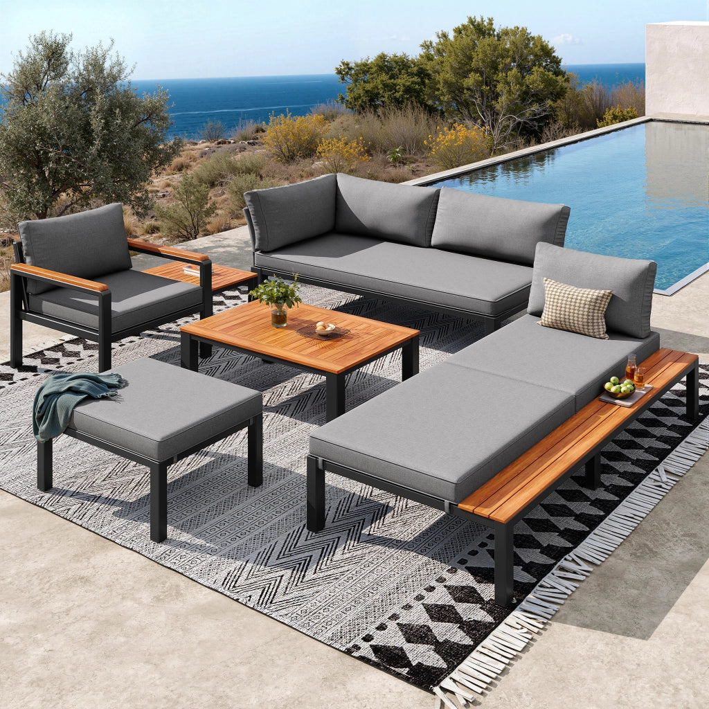 Set sedute modulari esterni: metallo; cuscini; tavoli legno; terrazza/balcone/piscina; grigio