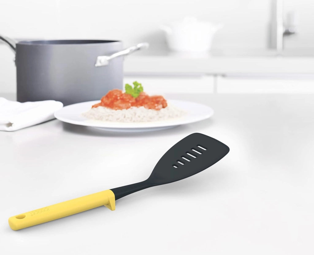 Joseph Joseph Duo Cucchiaio Forato Resistente al Calore, Cucchiaio da cucina con Poggiamestolo integrato, Antiaderente, Giallo Chiaro