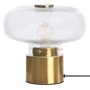 Lampada da tavolo con base in ottone e paralume in vetro testurizzato trasparente; design moderno e glamour per il soggiorno
