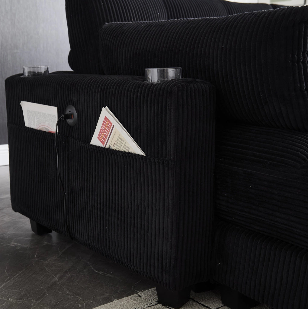 Divano 2 posti in velluto a coste nero con 2 cuscini, 4 portabicchieri, 4 tasche laterali e porte USB