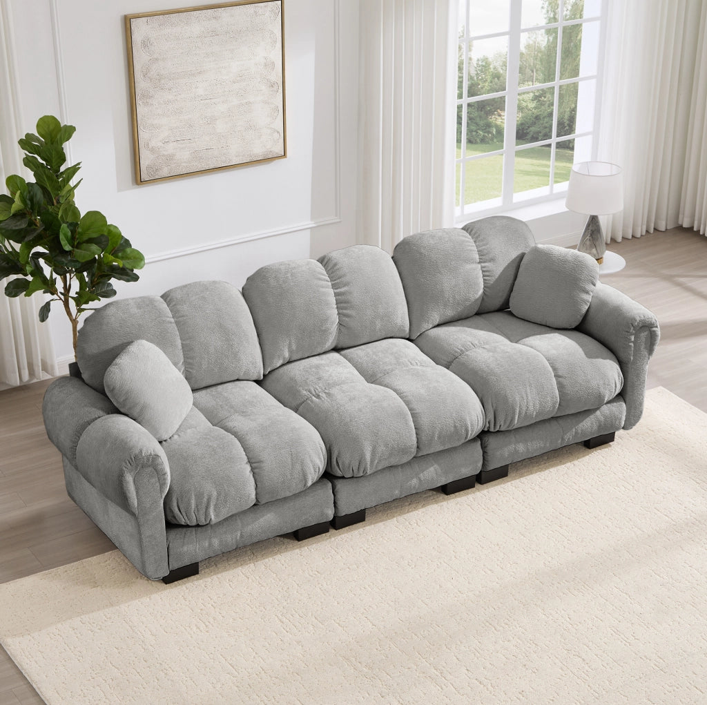 Divano modulare in chenille 260x86x90 cm con cuciture trapuntate; cuscini spessi; grigio chiaro