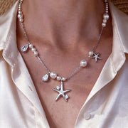collana di perle a forma di stella