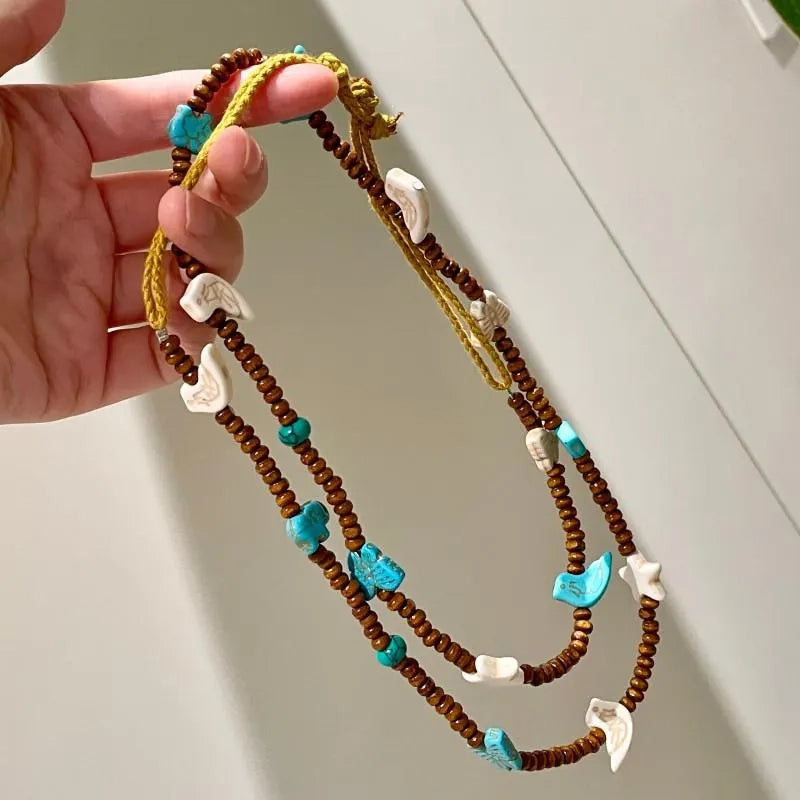 Collana vintage con farfalla e perline: ciondolo a stella in legno fatto a mano