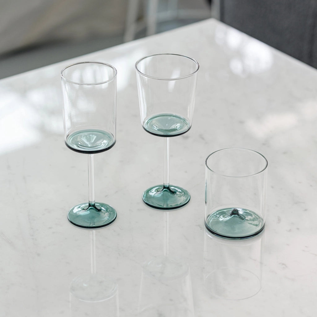 Set di 4 Tumbler Discobolo in Vetro Borosilicato Soffiato a Mano, Capacità 34,5 cl, Design Trasparente con Fondello Verde Lago per Tavole Raffinate