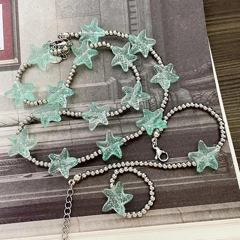 Set di gioielli boh¨¦mien fatti a mano con perline: bracciale, anello e collana.