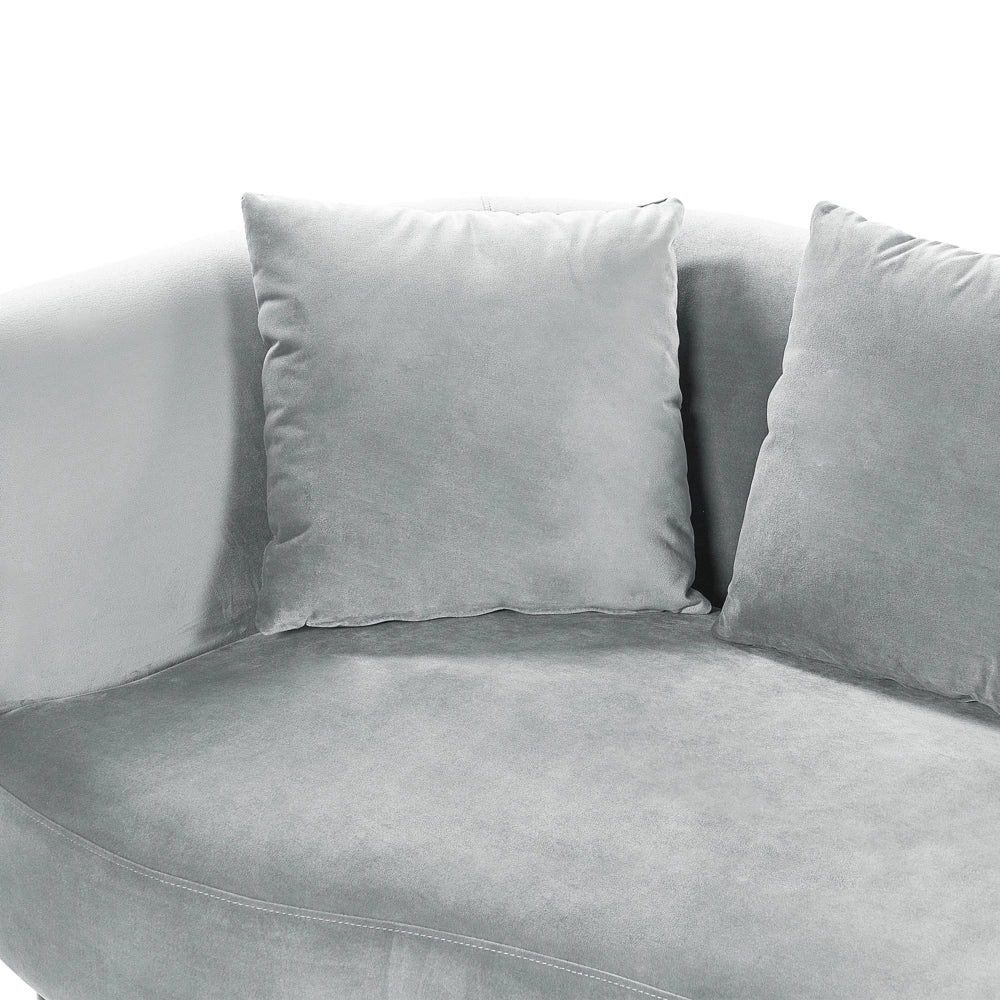 Chaise Lounge in velluto grigio chiaro lato sinistro gambe in legno scuro design moderno