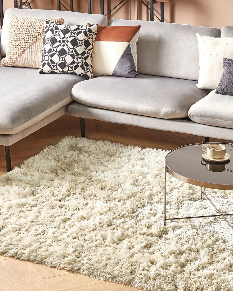 Tappeto Shaggy Tappeto a pelo lungo Solid Beige Poliestere Rettangolare 140 x 200 cm