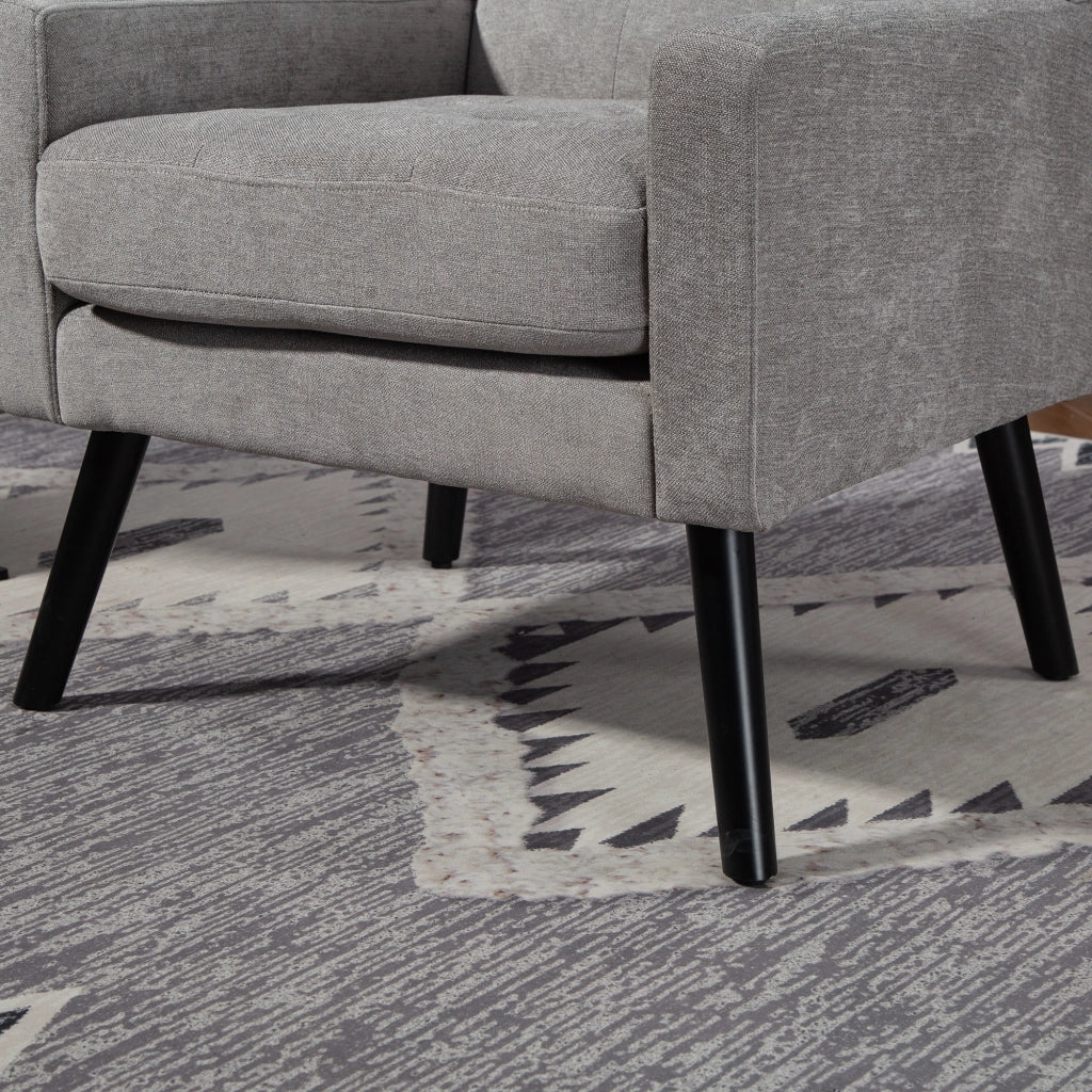 POLTRONA imbottita in lino grigio chiaro con gambe in legno massello