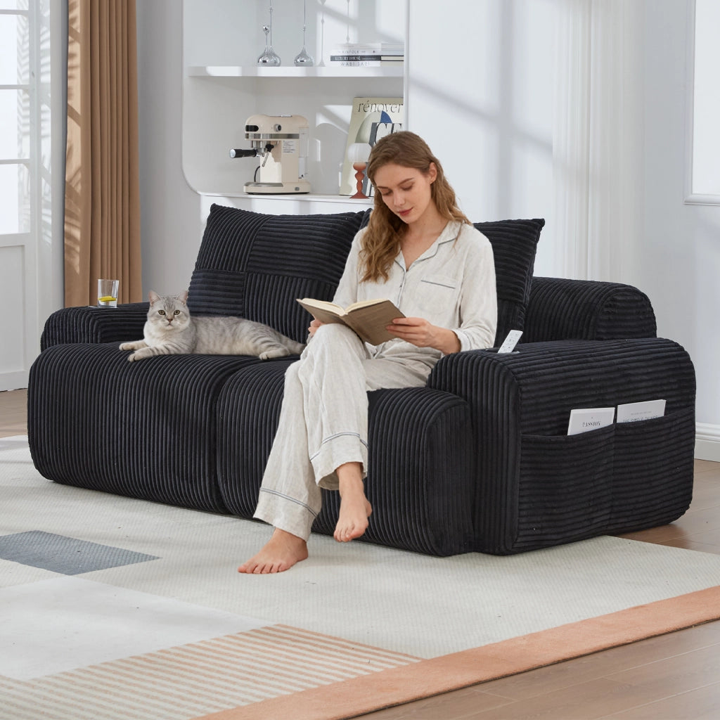 Divano modulare a 2 posti con portabicchieri e tasca laterale con imbottitura ergonomica in tessuto a coste nero