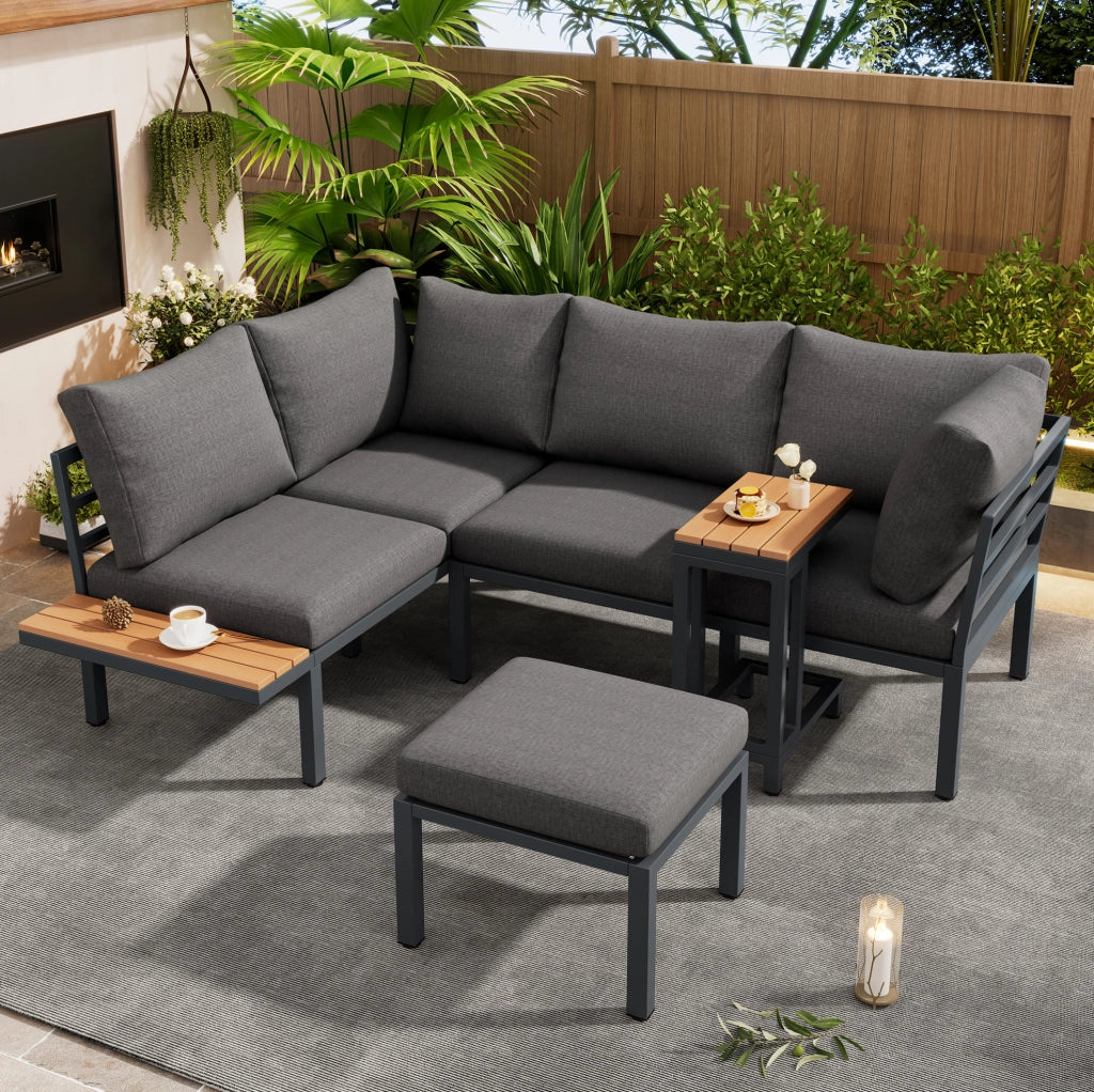 Set da giardino con divano angolare; tavolino laterale e tavolino/poggiapiedi; grigio e nero