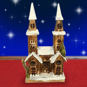 Trade Shop - Casetta Legno Innevata Luminosa Con 2 Torri Altezza 40 Cm Decorazioni Natalizie -