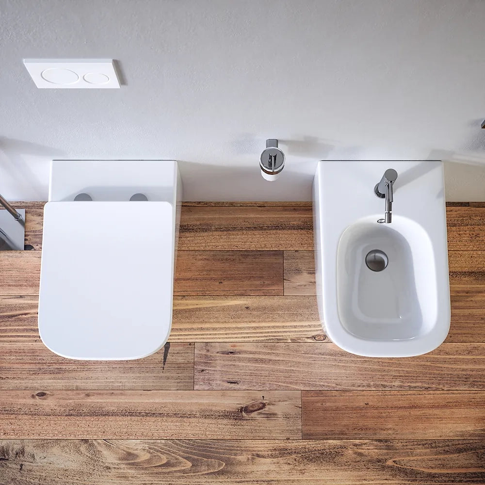 Sanitari filomuro in ceramica bianco lucido vaso tornado silent flush sedile soft-close e bidet | Riga