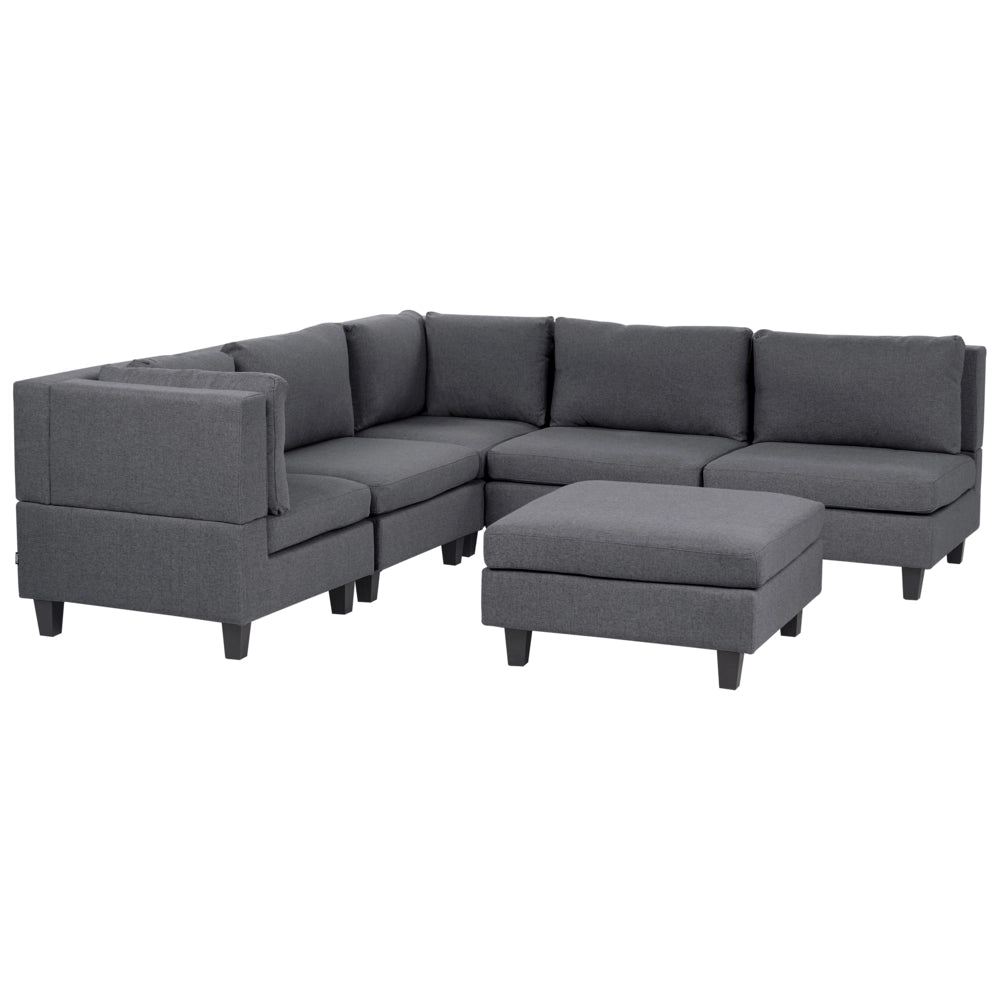 Divano componibile a 5 posti imbottito lato destro in tessuto grigio scuro con gambe nere e pouf stile moderno