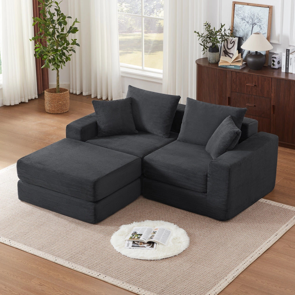 Divano modulare multifunzionale in corduroy grigio scuro, trasformabile in configurazioni diverse per soggiorno e spazi compatti