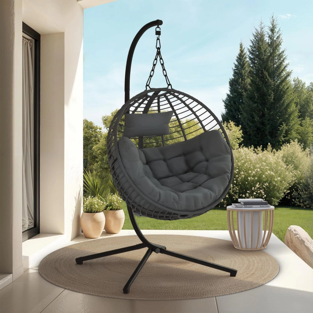 Poltrona Rotonda Traforata con Effetto Rattan Grigio e Cuscino Grigio