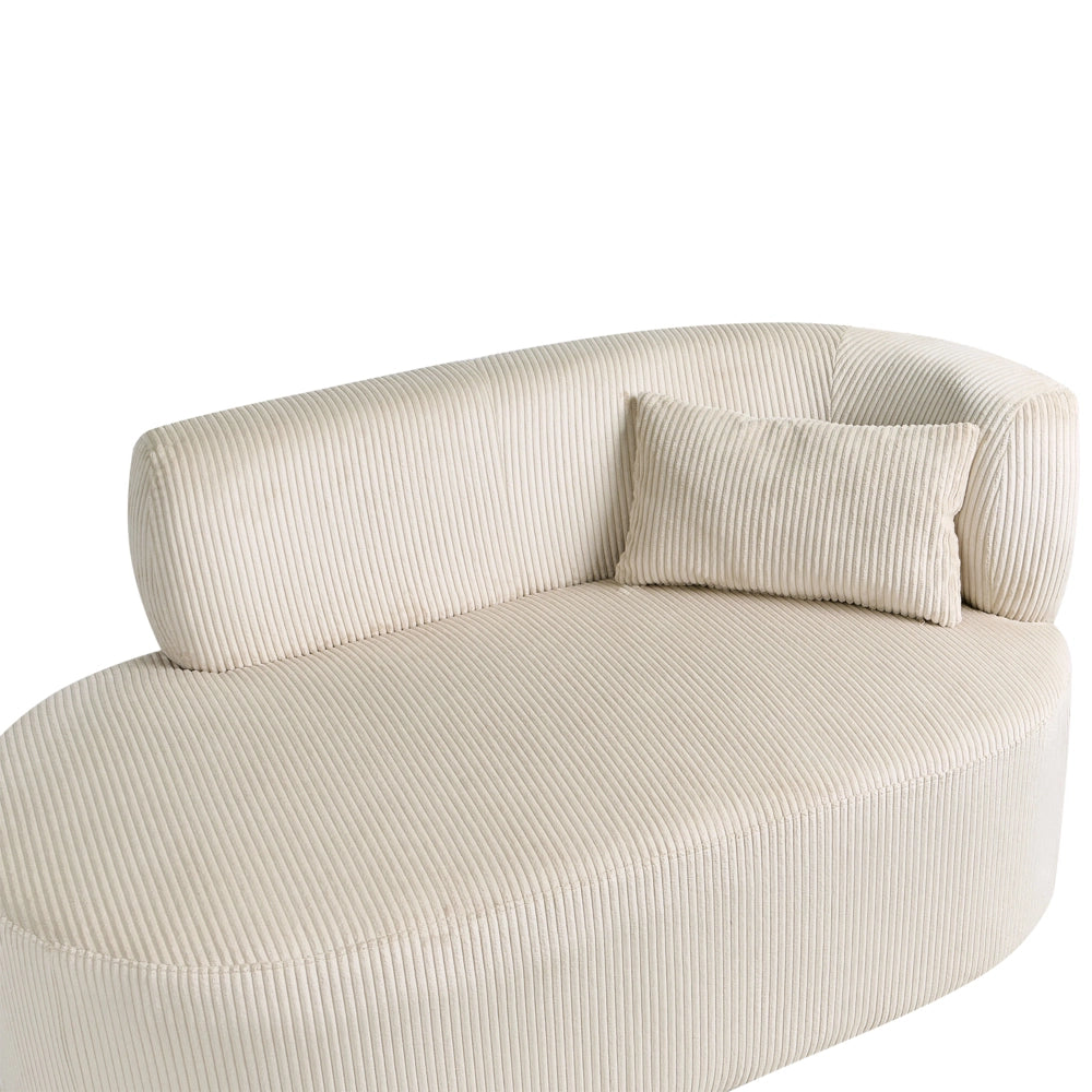 Chaise longue con rivestimento in velluto a coste beige chiaro e cuscino decorativo lato destro