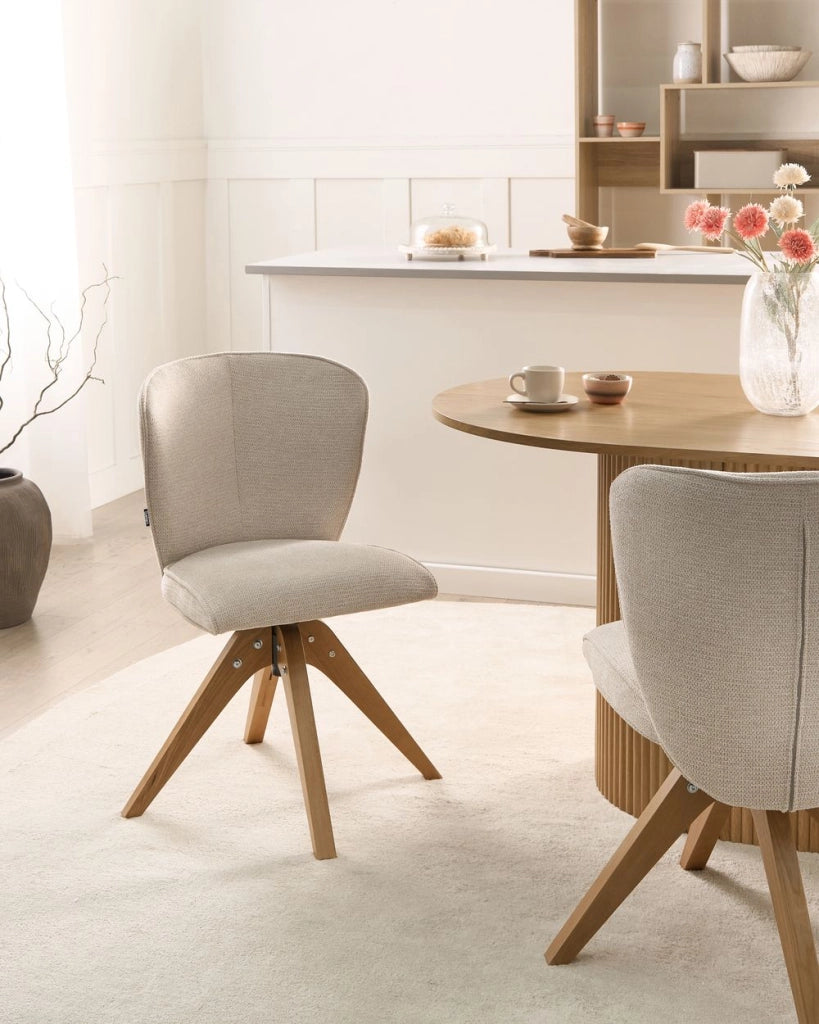 Set di 2 sedie da pranzo girevoli Rivestimento in tessuto beige chiaro Base con gambe in legno girevoli in metallo