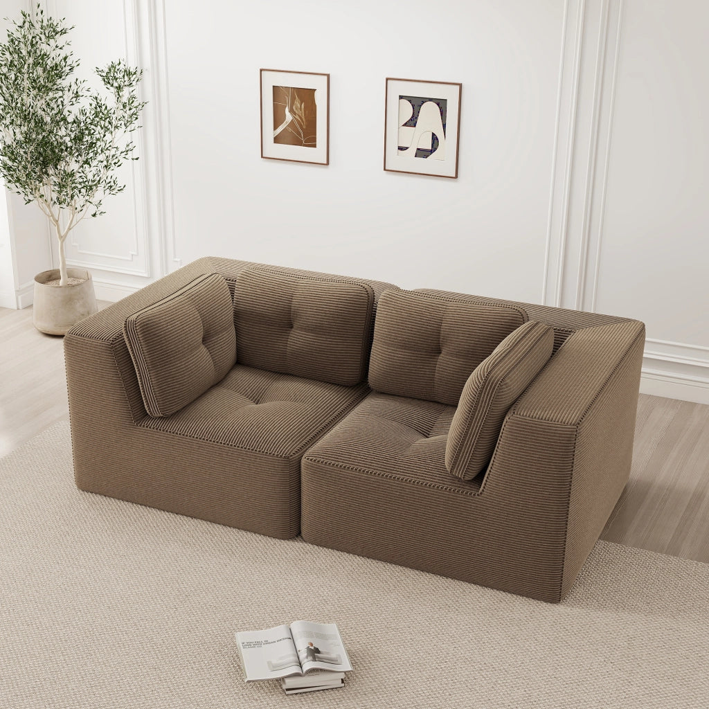 Divano angolare modulare senza struttura con seduta profonda e braccioli larghi in corduroy marrone per soggiorno e camera da letto