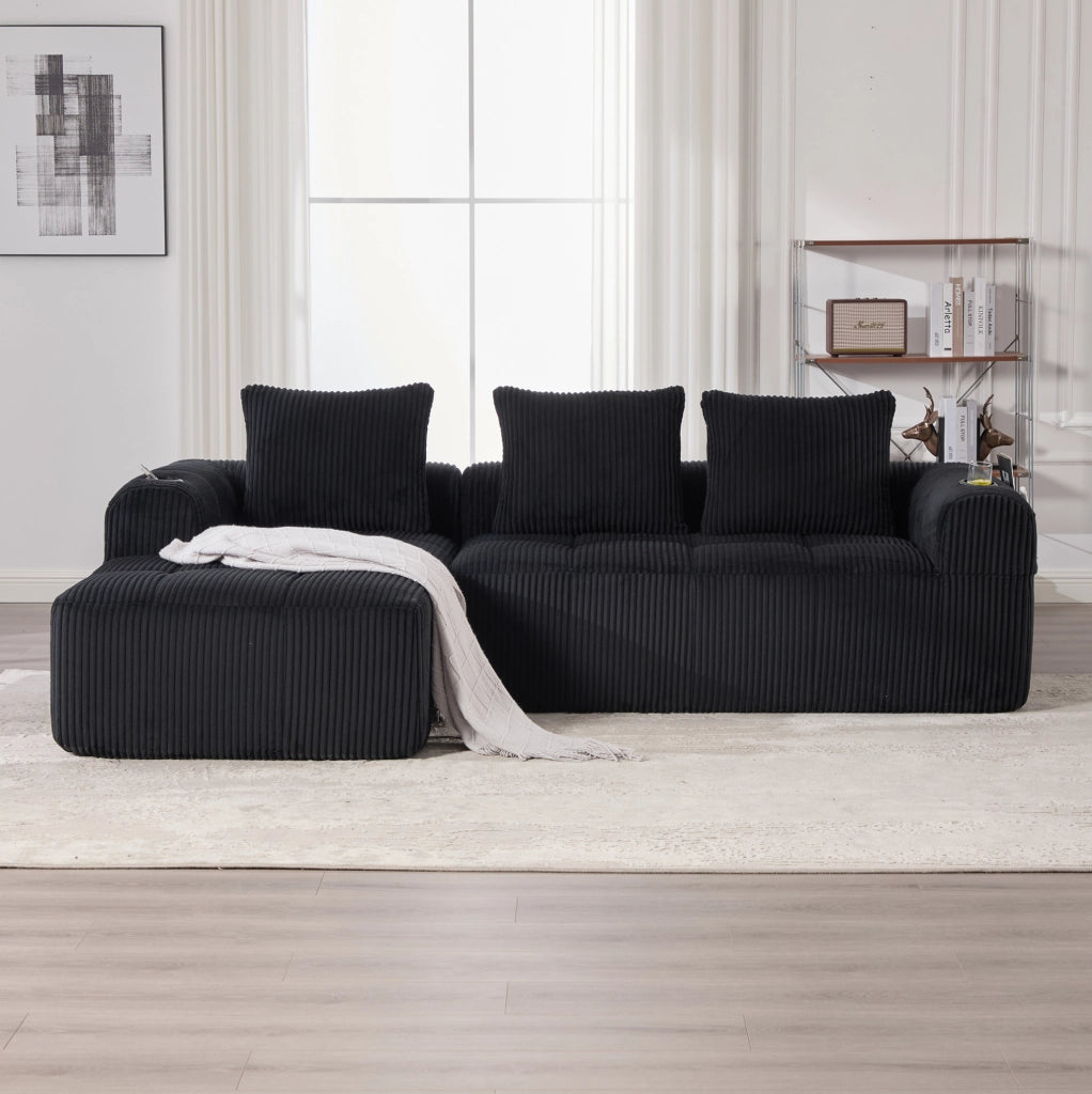 Sofa modulare in corduroy nero con tasche laterali e portabicchieri; 253 x 158 x 61 cm
