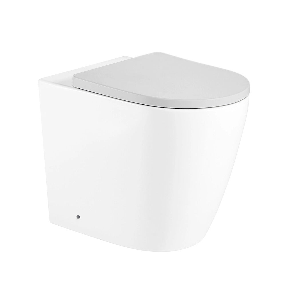 Copriwater bianco in termoindurente dal design ovale per sanitari Velora
