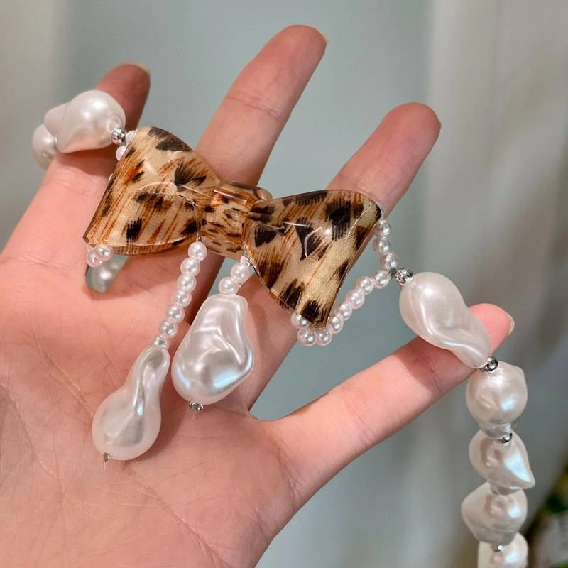 Collana di perle a forma di fiocco fatta a mano, regalo di Natale o di compleanno.