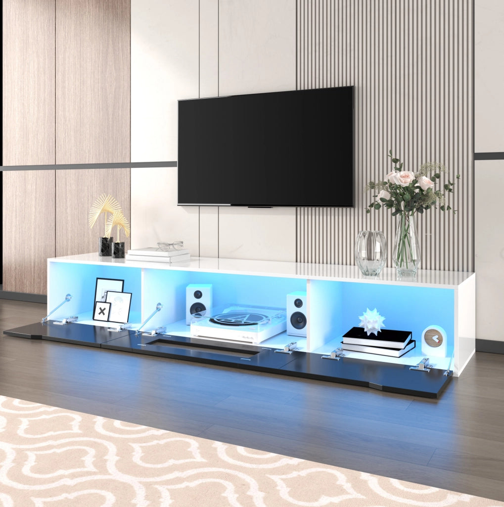 Mobile TV bianco e nero con frontale scanalato; LED a 16 colori; 180 × 35 × 30 cm