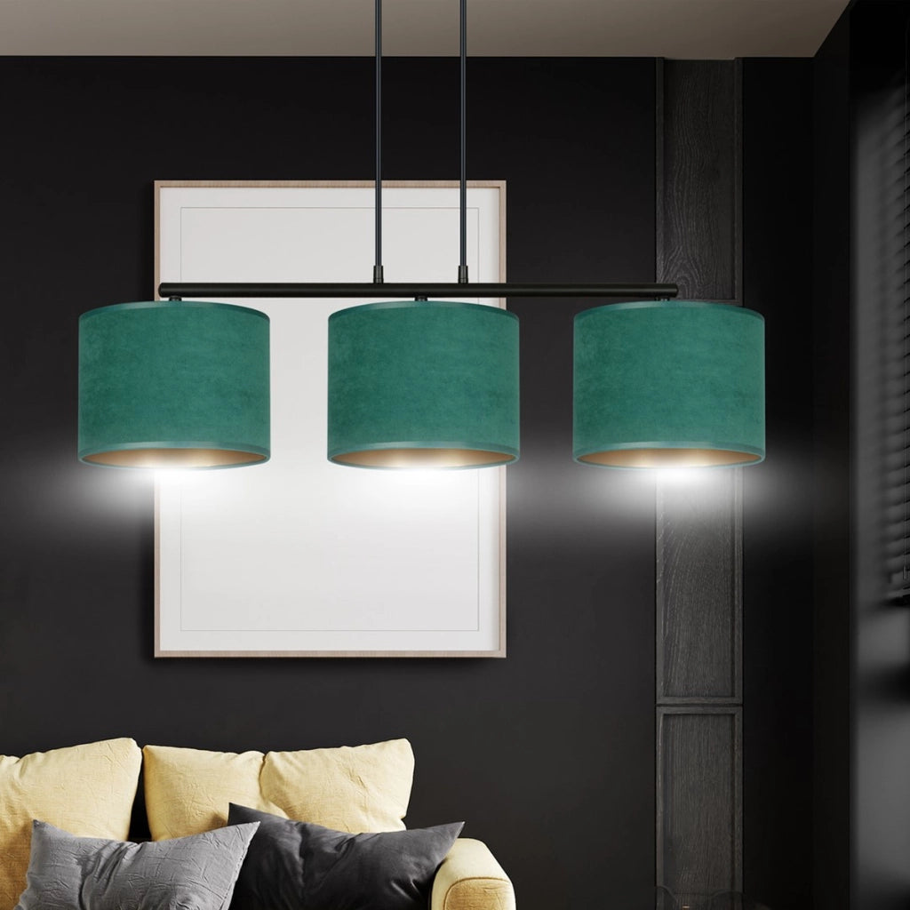 Lampada a sospensione Hilde in acciaio e velluto verde