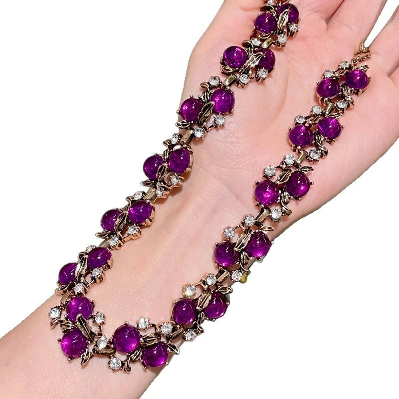 Collana, bracciale e orecchini a forma di foglia in resina viola con strass, in stile vintage.