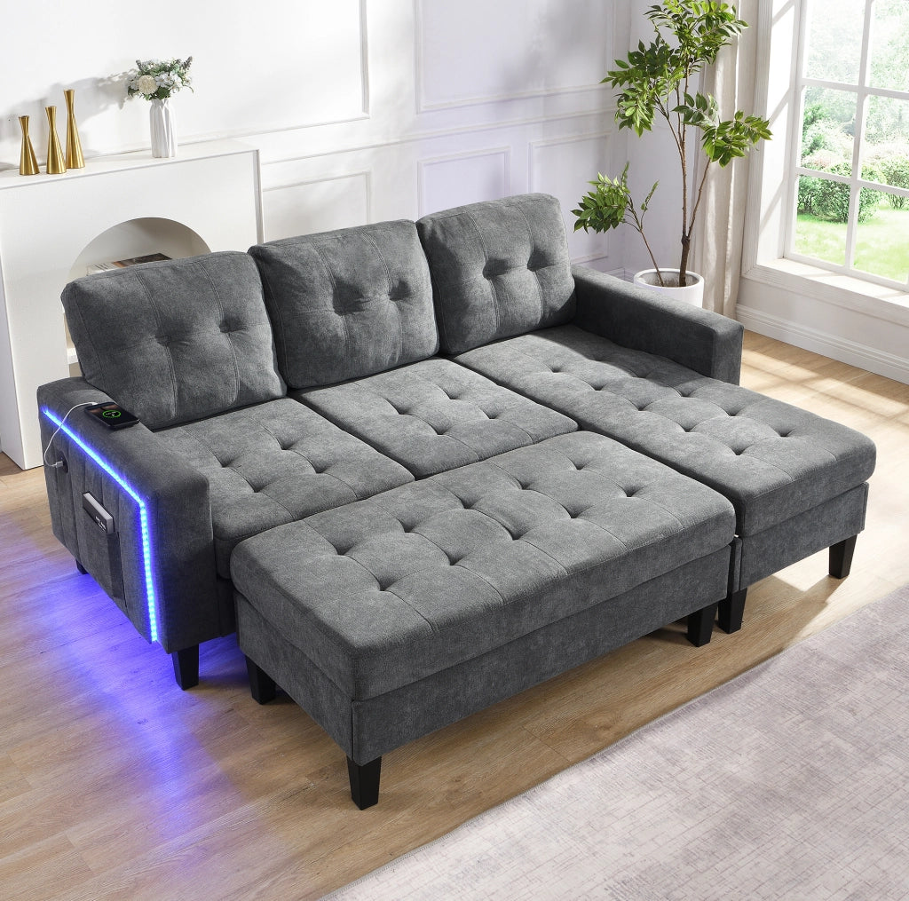 Divano letto angolare 185x135x85 cm; modulare con pouf mobile; LED e USB in chenille grigio antico
