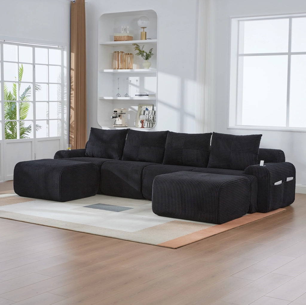 Divano modulare 4 posti in corduroy nero; con portabicchiere e tasca laterale; 333 x 174 x 80 cm