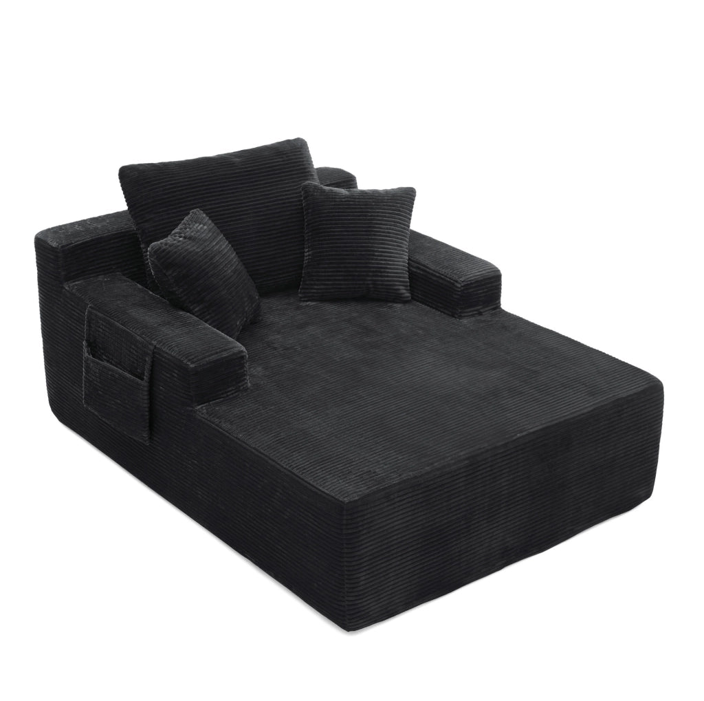 Divano compatto in corduroy nero con tasche laterali e cuscini; stile retr貌