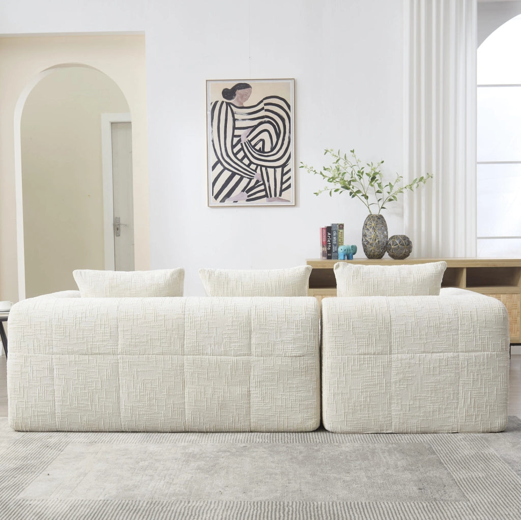 Divano chaise longue in ciniglia beige con tasche laterali e cuscino