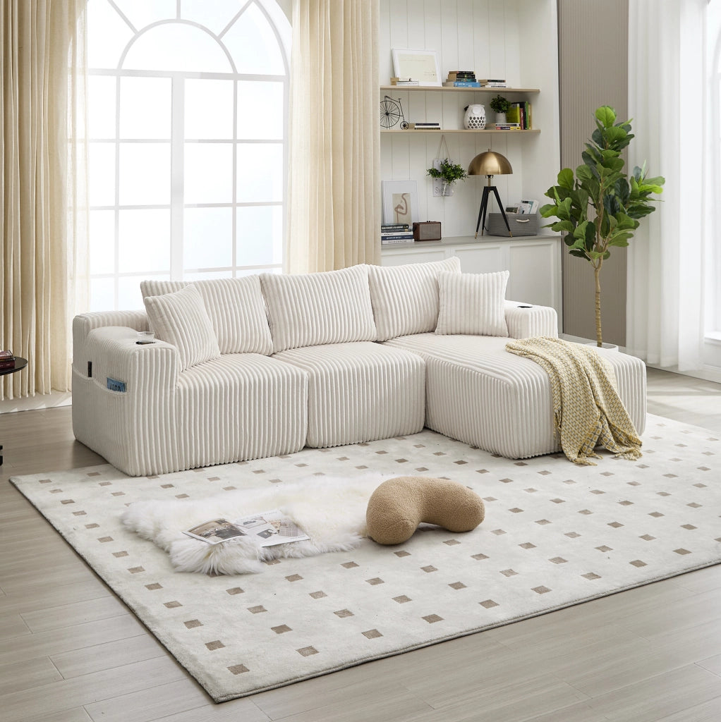 Divano modulare in velluto a coste beige con chaise longue