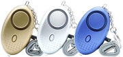 Alarme di Sicurezza Personale per Donne - 3-pack - Riciclabile - Sirena a 140DB con Luce LED - Sirena con Luce LED - Dimensioni: 6,7*3,8cm - Colori: Giallo+Argento+Azzurro