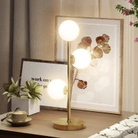 Lampada da tavolo con 3 paralumi a sfera, base in acciaio stabile, portalampada G9, 24 x 24 x 53 cm, Ottone