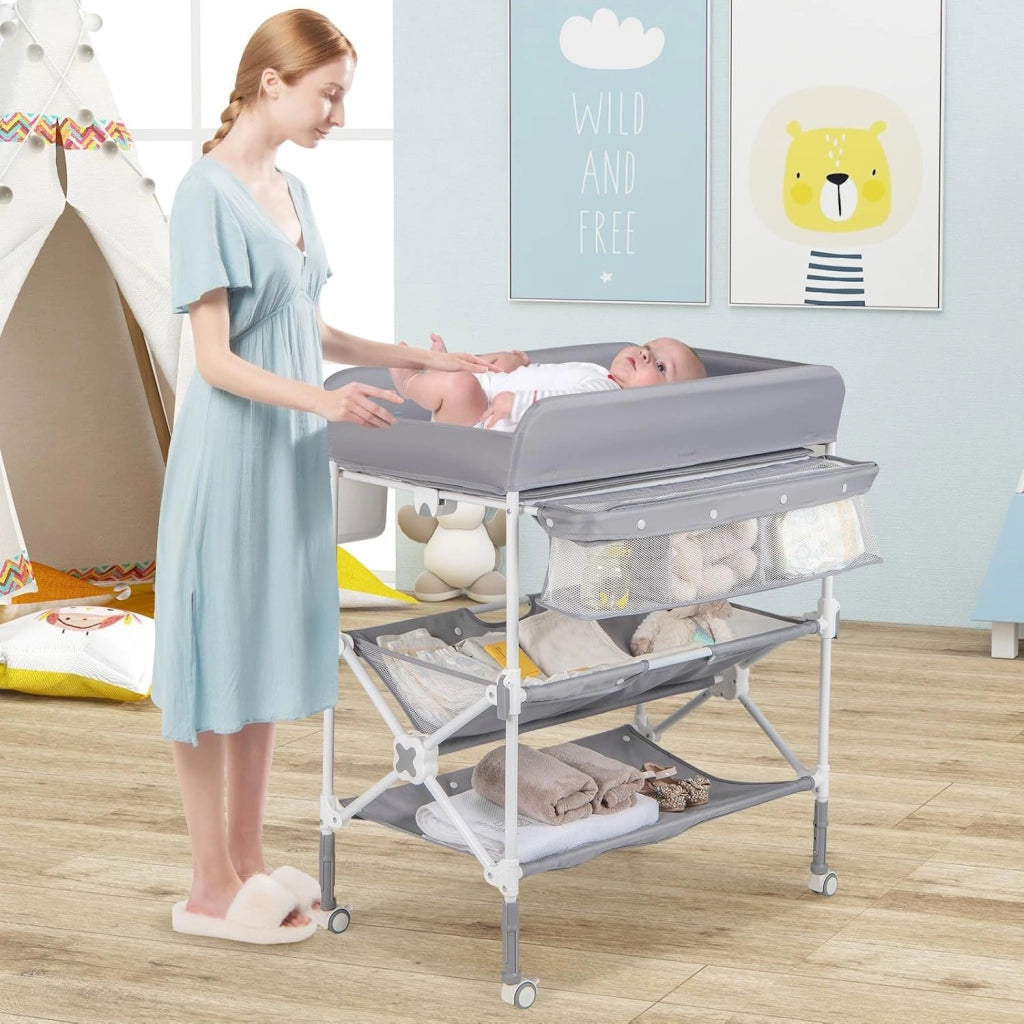 Fasciatoio Pieghevole Neonato, Fasciatoio Portatile con Altezza Regolabile, Comodino per Pannolini con Ruote di Bloccabili, 2 Ripiani, Porta Asciugamani, Cestino di Rifiuti (Grigio)