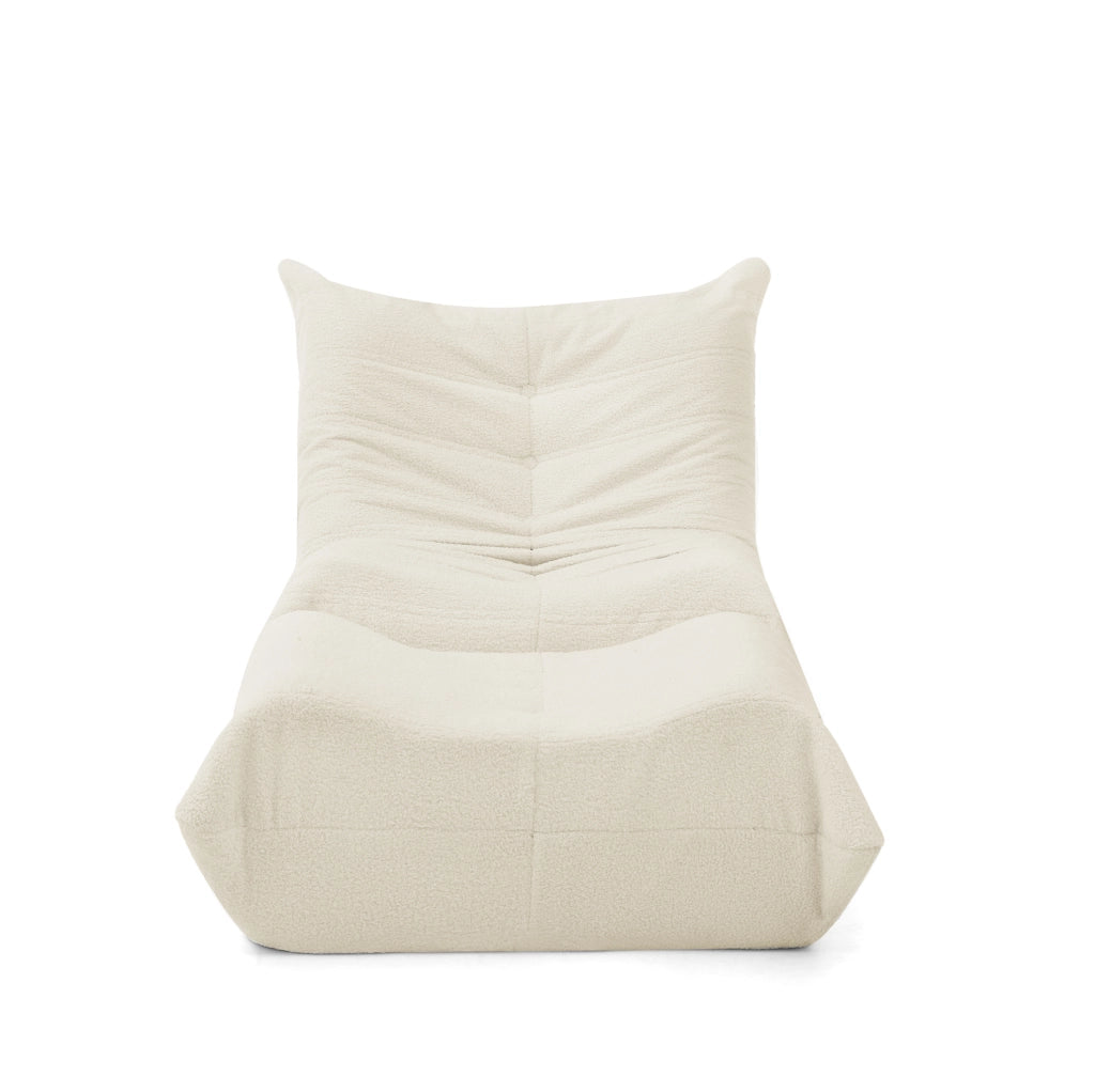 Poltrona da pavimento in teddy beige con poggiapiedi