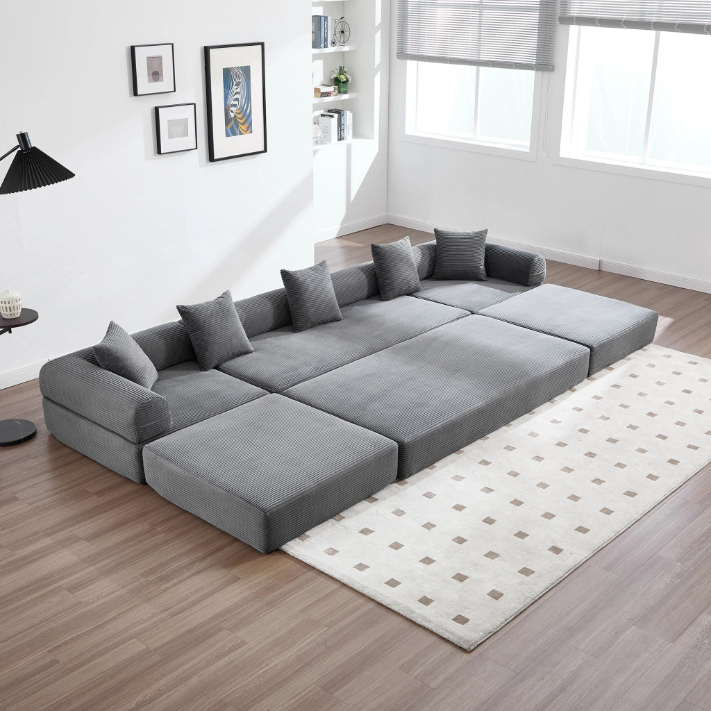 Divano modulare letto con tasca laterale e funzione letto in velluto a coste grigio scuro