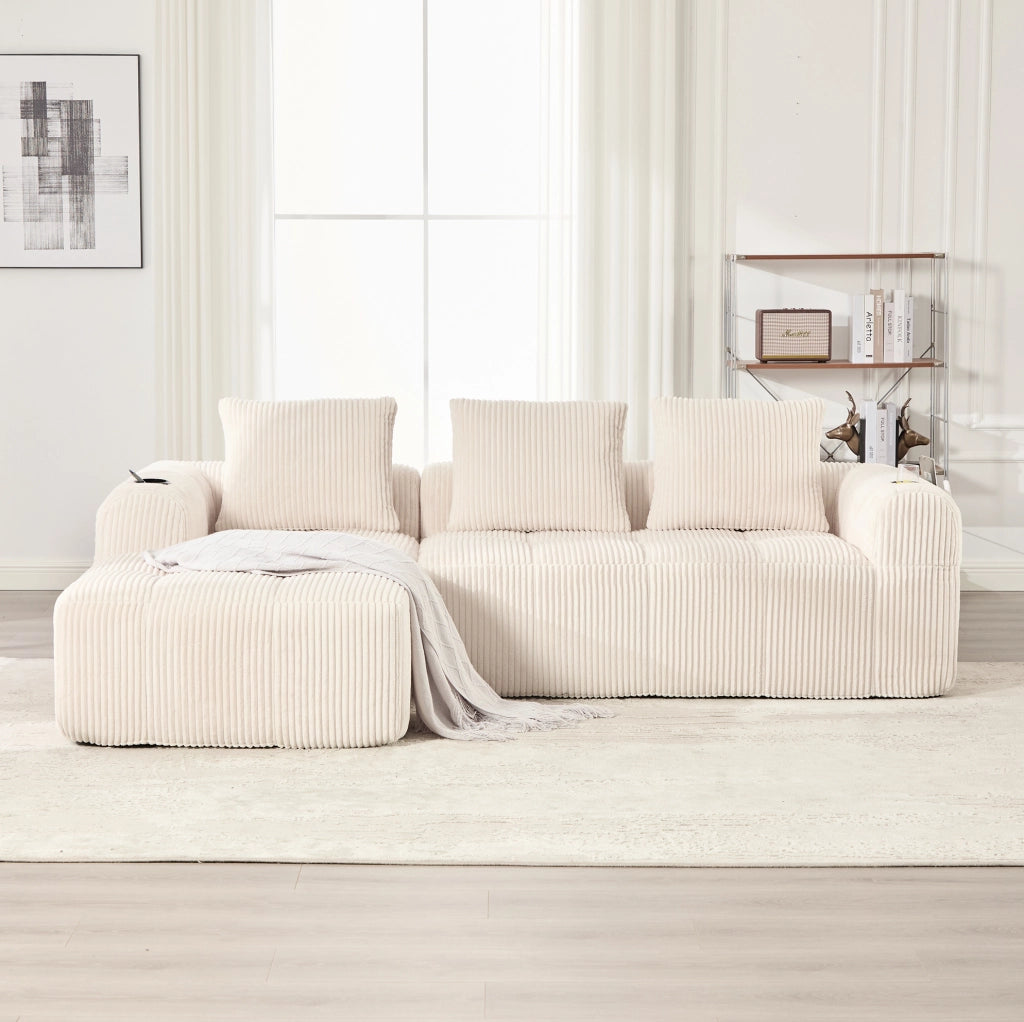 Sofa modulare 253x158x61 cm con sistema DIY; tasche laterali e portabevande in cord beige