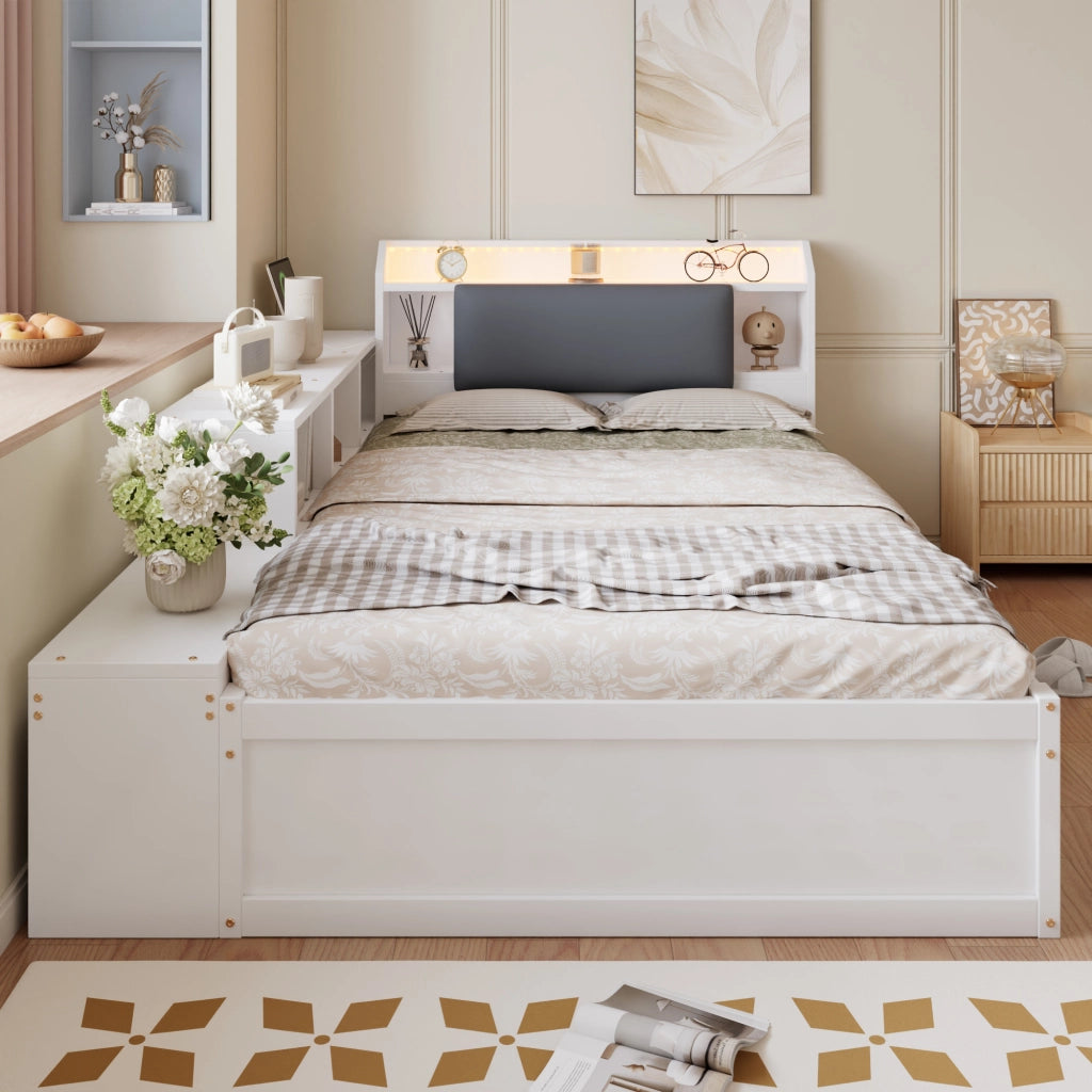 Letto contenitore 120x200 cm con apertura idraulica reversibile; testiera imbottita con vani; LED e USB; legno bianco
