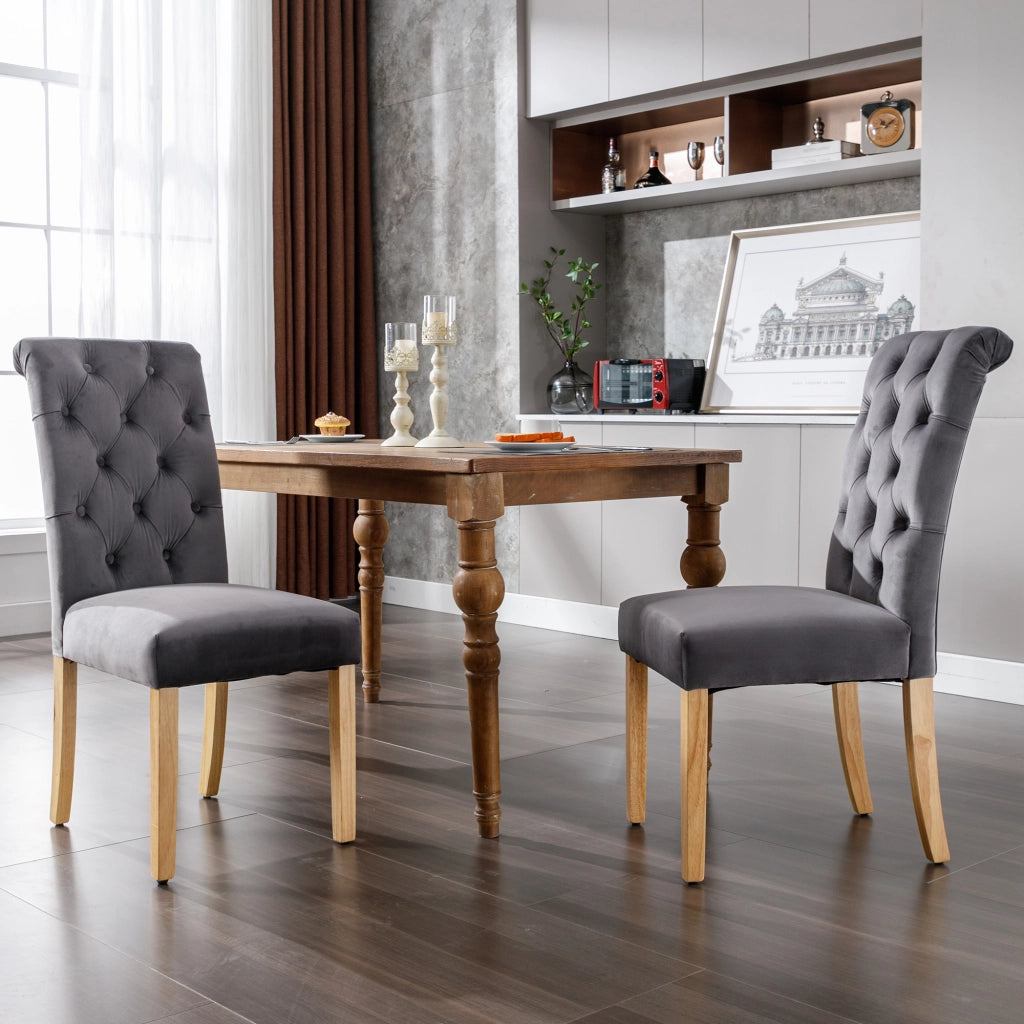 Set di 2 sedie da sala da pranzo in velluto grigio con gambe in legno di quercia, schienale curvo e design capitonné