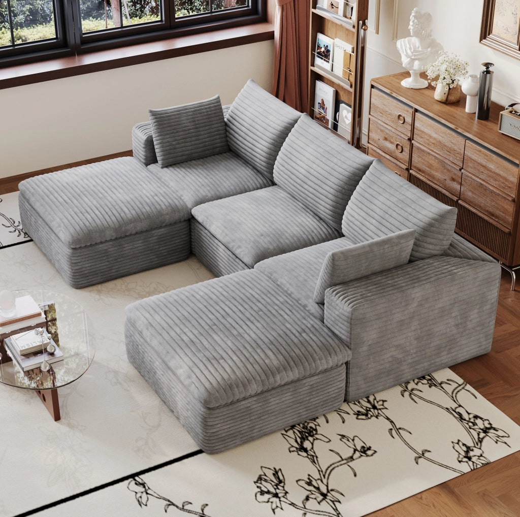 Divano modulare ULEVR in tessuto grigio con supporto interamente in schiuma e design configurabile